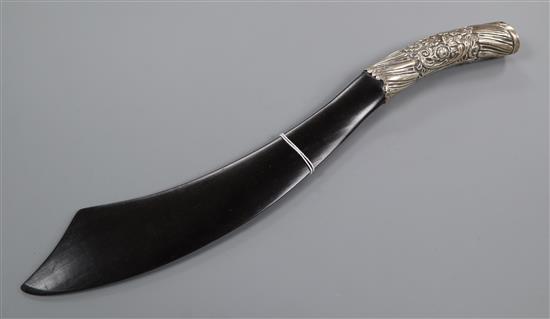 A late Victorian silver handled ebony scimitar shaped page turner, London, 1890, 39.9cm.